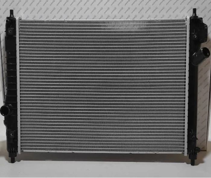 Радиатор охлаждения  AVEO МКПП L=600мм с кондиционером (паяный) "SHIKOO"